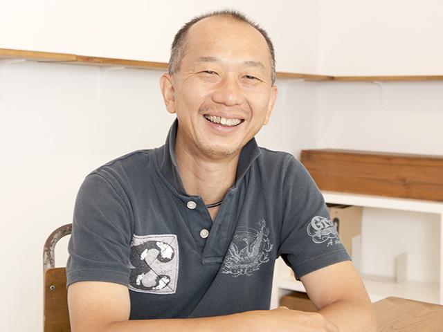 代表取締役社長の荻野明彦氏。富士ゼロックスにて営業職として活躍後、社内プロジェクトから発展したコンテンツワークスの代表に。趣味は読書とマラソン、水泳。
