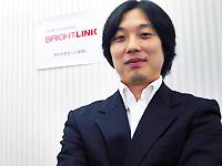 代表取締役社長　佐藤　良彦氏