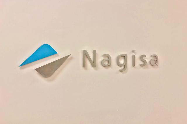 社名について「“Nagisa” = 渚のように、どんな波が来ても、しっかり受け止めて進化する会社に」と言う思いが込められている。