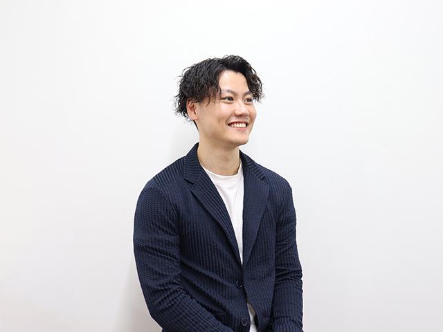 カスタマーサクセスG、村上課長。「おむつサブスクの手ぶら登園は、保護者も保育士のどちらにも喜ばれています。ビジネスの拡大が社会貢献につながるのが醍醐味です！」