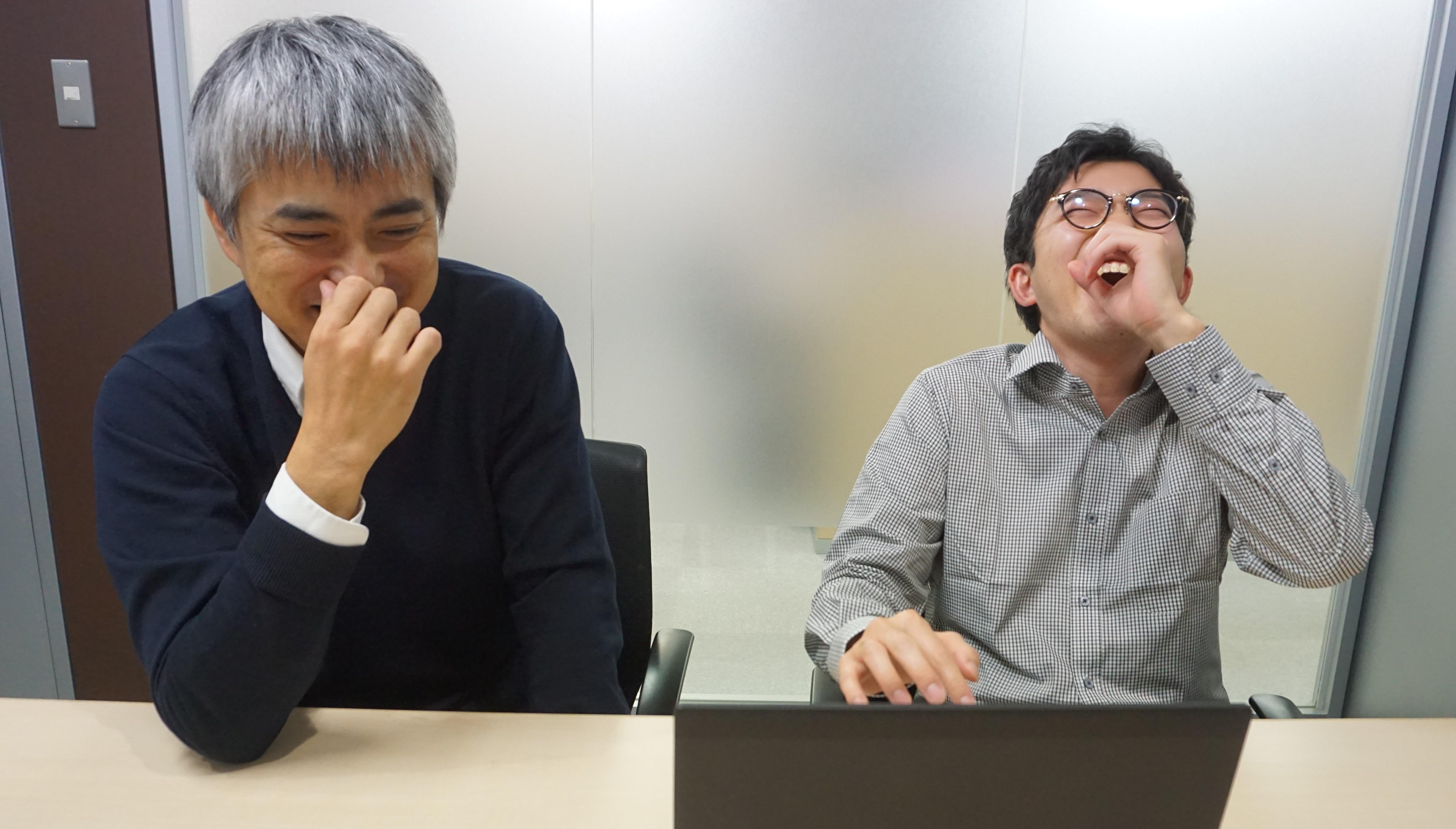 マネジャーとスタッフの打ち合わせ