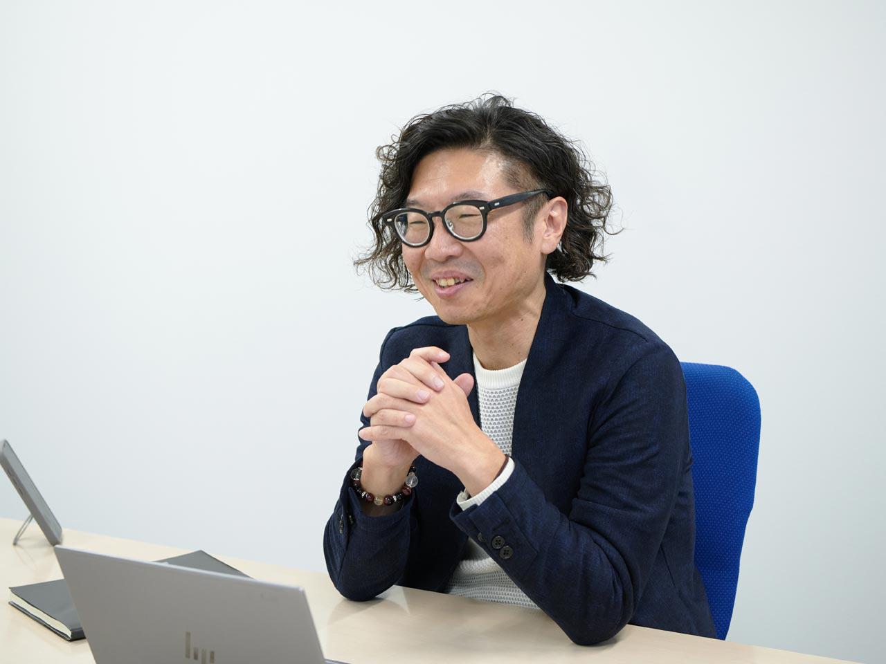 AIを活用した薬局の経営安定化に貢献できるシステム開発と品質のさらなる向上に注力している。(開発本部長　佐藤氏)